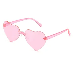Occhiali da sole senza montatura a forma di cuore rosa per bambini, stile grazioso e chic.