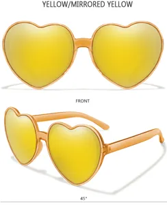Detailansicht modischer herzförmiger Sonnenbrille mit leuchtend gelben Spiegelgläsern.