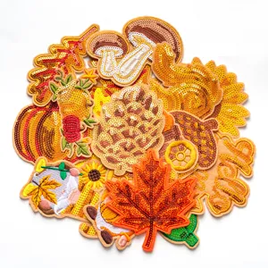 Conjunto de parches bordados con lentejuelas de otoño hoja de arce calabaza