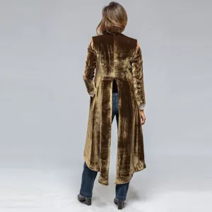 Detailed back view of women's vintage velvet long trench coat, showcasing back split design.