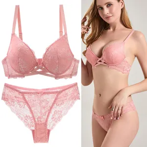 Sexy lace bra and panties set for women, push-up underwear with cross strap design.
