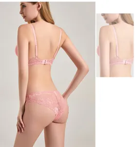 Back view detail of women's pink lace bra strap and intimate underwear set showcase.