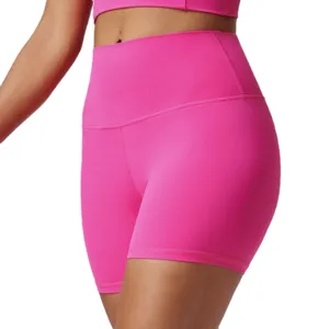 High-waisted pink fitness yoga shorts, premium stretchy athletic wear for gym and running.
