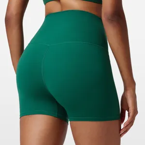 High-waisted green yoga shorts for women, perfect for running, fitness, and pilates training.
