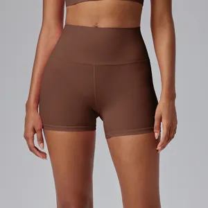 High-waisted brown yoga shorts for women, stretchy fitness and running athletic sportswear.