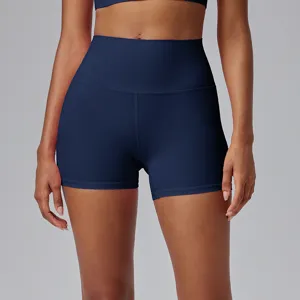High-waisted athletic yoga shorts close-up view, dark blue activewear training apparel.