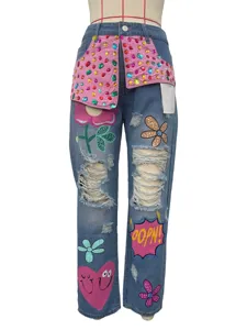 Pantalon en denim style rue imprimé déchiré avec strass mode pour femmes élégantes.