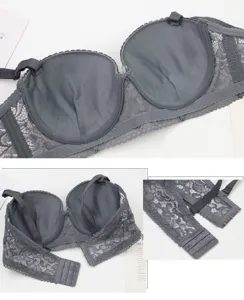 Detail view of women's grey lace push-up bra with steel ring, showing cups and back closure.