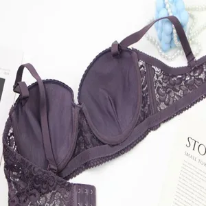 Dark purple lace push-up bra for women, elegant floral lace design with supportive back hooks.