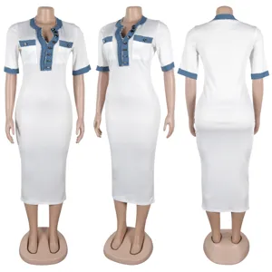 White bodycon dress featuring blue denim patchwork, V-neck with buttons and short sleeves.