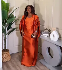 Elegant orange satin plus size long maxi dress with square neckline and delicate chest embroidery.