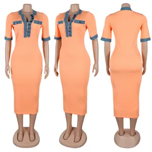 Women's orange ribbed bodycon midi dress with denim patch details and v-neck style.