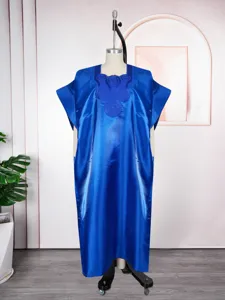 Detail view of blue satin embroidered long dress, loose fit casual kaftan maxi dress for women.