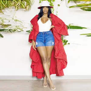 Women's solid color ruffles patchwork bell sleeve long trench coat fashion outerwear detail.