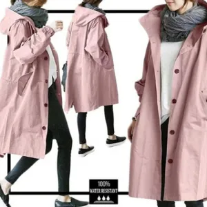 Detailed view of women's casual loose mid-length pink trench coat with hood and waist.