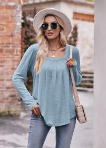 Casual women solid color square neck long sleeve pleated top detail showing style and fit.