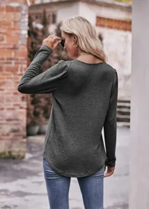 Solid color long sleeve puff sleeve casual top paired with classic jeans for daily wear.