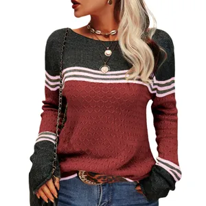 Close-up detail view of women color block striped knitted sweater long sleeve casual top.