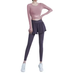 Women activewear set long sleeve crop top and high waist two-in-one yoga pants for fitness.