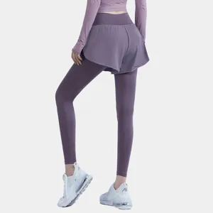 Back detail view of women's purple athletic fake two-piece yoga pants and long sleeve activewear.