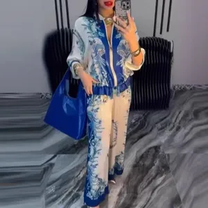 Blue and white printed two piece set detail showing chic jacket and trousers for women.