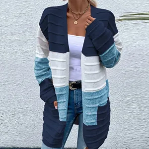Detailed view of women's color block knitted cardigan sweater with long sleeves and pockets.