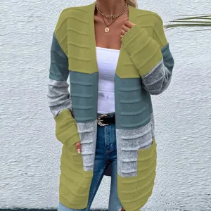Detail view of the multi-color block knitted cardigan featuring textured stripe design.