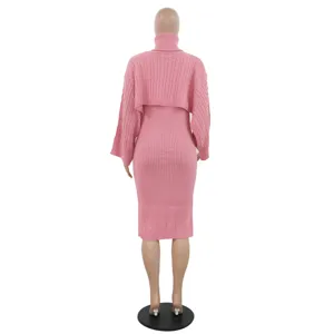 Back view detail of casual pink cable knit turtleneck sweater dress two piece set.