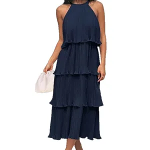 Elegante vestido largo liso sin mangas con volantes y cuello halter para mujer, ideal para playa.