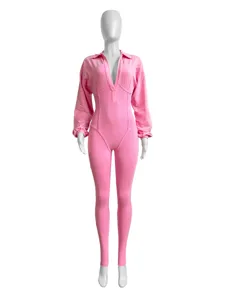 Pink long sleeve deep V-neck fitted jumpsuit detail showing front design and seams.