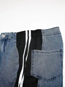 Close-up detail of women high waist patchwork jeans, casual striped denim trousers.