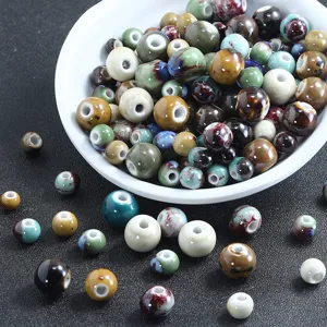 Perles en ceramique emaille 6-12mm rondes melangees pour fabrication de bijoux et bracelets DIY.