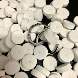 Bulk white foam pads for jewelry packaging, ear stud cards fixings, and shock absorption.