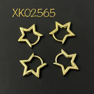Gold star hoop earrings close-up, DIY jewelry making findings, copper metal craft accessory.