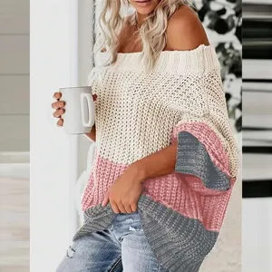 Dettaglio in primo piano del maglione in maglia colorblock con spalle scoperte, chic casual.