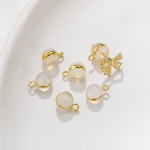 Clear silicone earring backs with gold loops and bow design, perfect for diy jewelry making.