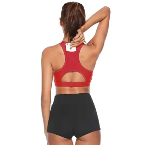 Back detail view of red sports bra with phone pocket, racerback design, activewear.