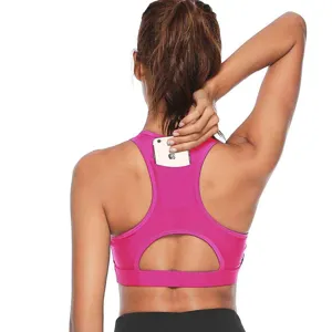 Back view of fuchsia sports bra with phone pocket, racerback yoga crop top, breathable activewear.