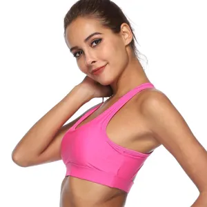 Detailed close-up view of the pink solid color U-neck crop active sports bra fitness top.