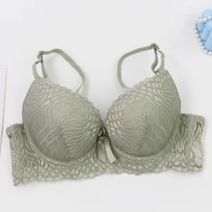 Green lace push up bra for women, sexy French style undergarment with adjustable straps.
