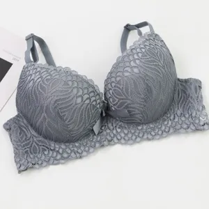 Women's grey lace push-up bra, elegant floral design, comfortable and supportive lingerie.