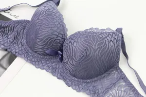 Detailed view of French plus-size floral lace bra in elegant purple, offering comfort and style.