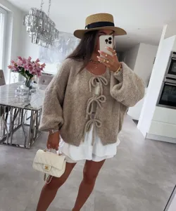 Cárdigan de punto muy cómodo para mujer con lazos bonitos y cuello redondo elegante.
