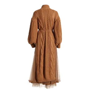 Brown knit mesh spliced long dress, elegant cable knit design with bubble sleeves for women.