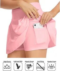 Pink athletic sports skort for women, high waist pleated tennis skirt with pocket and shorts.