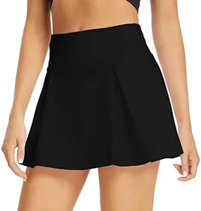 Black pleated athletic skirt detail view, high waist sports fitness tennis skort design.