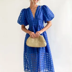 Blue V-neck puff sleeve midi dress with checkered sheer fabric and elegant waist design.