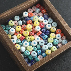 Colorful ceramic evil eye beads spacer charms for DIY bracelet necklace jewelry making supplies.