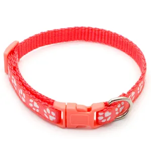 Red nylon pet collar with cute white paw prints, durable plastic buckle and metal D-ring.