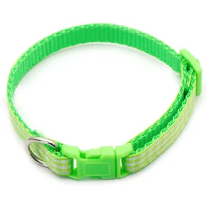 Green plaid pet collar detail, durable nylon strap with plastic buckle and metal d-ring.